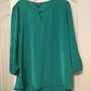 Pretty green top with cut out sleeves